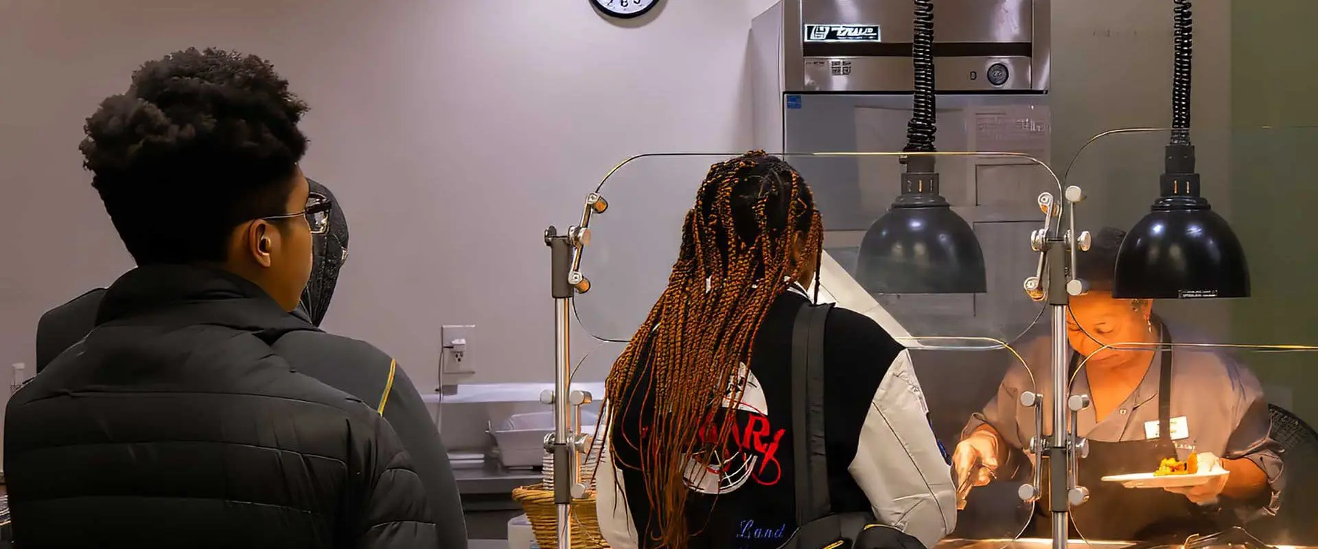 Students in line at dining hall waiting to be served