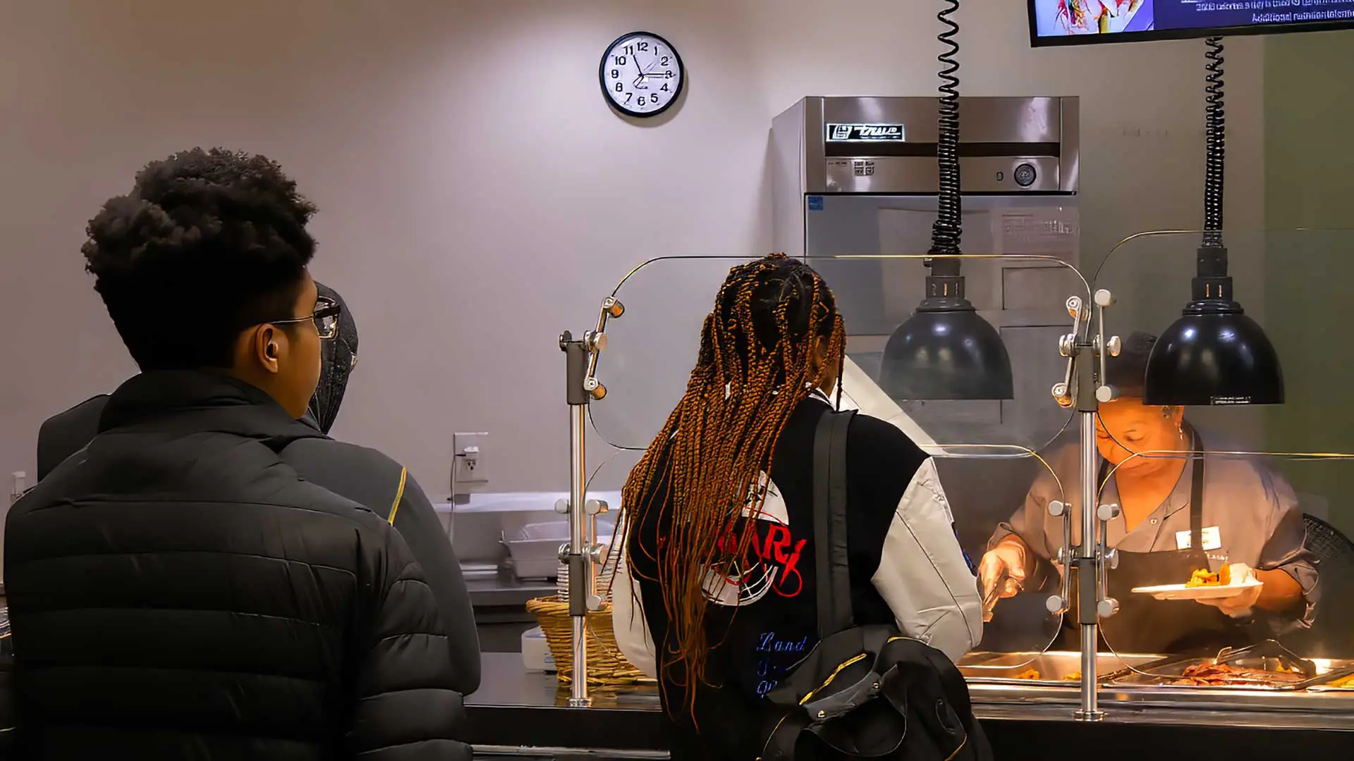 Students in line at dining hall waiting to be served